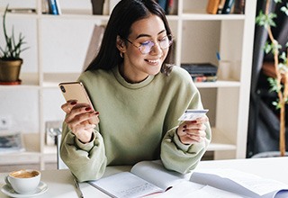 Woman using a credit card