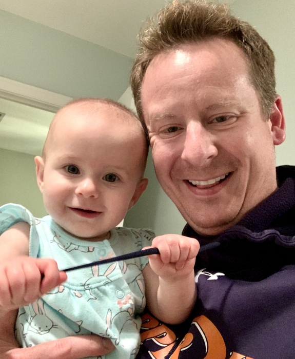 Doctor Collins and his wife with their two small children