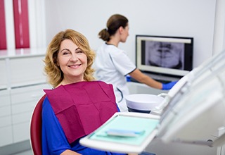 Older woman with dental implants in Weatherford smiling