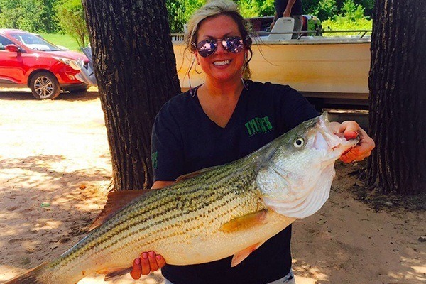 Michelle holding a fish