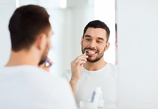 Be sure to brush with a soft bristled toothbrush following scaling and root planing