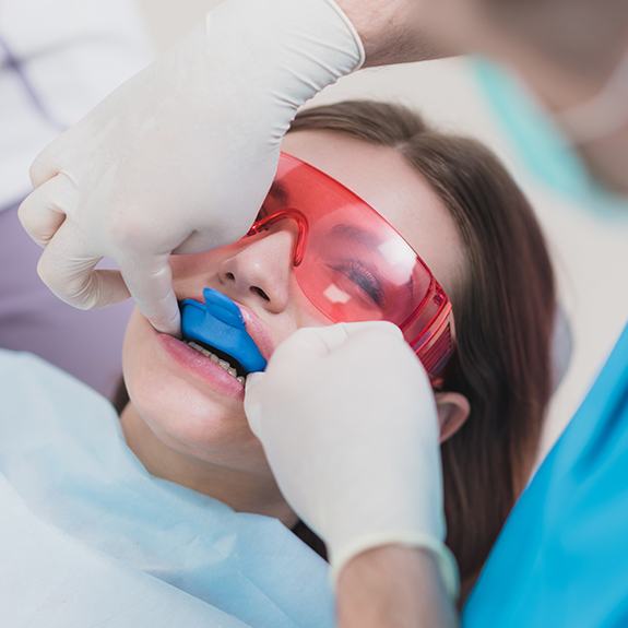 Patient receiving fluoride treatment