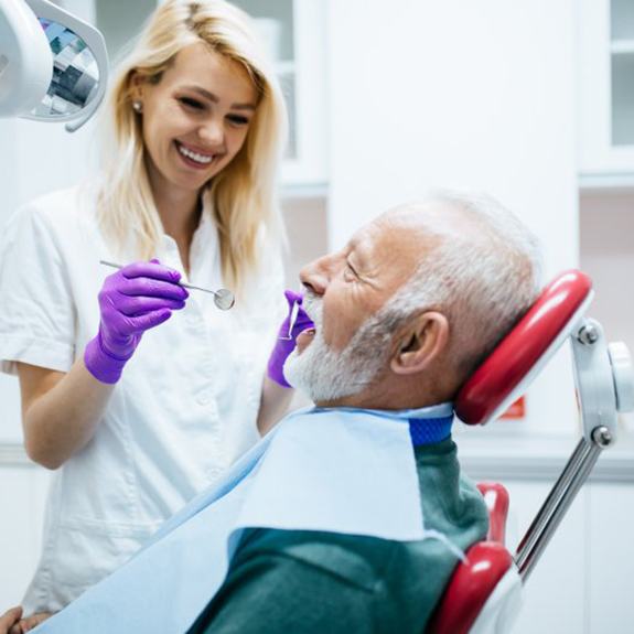 a patient undergoing dental implant salvage treatment