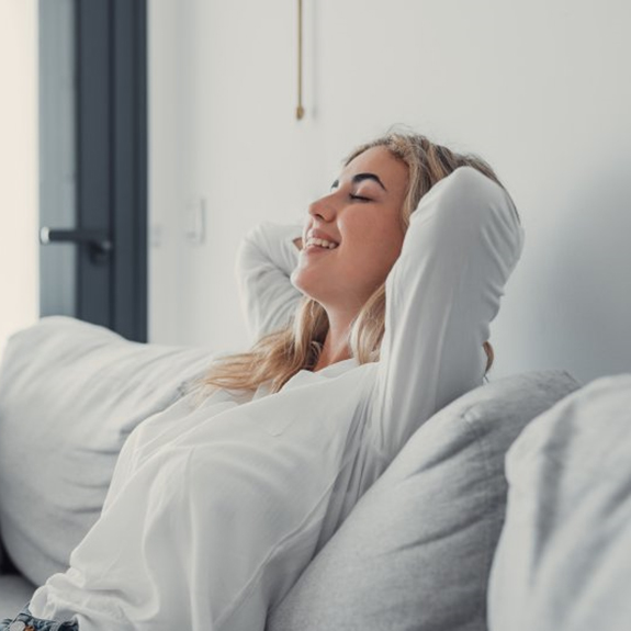 a woman resting after undergoing oral conscious sedation