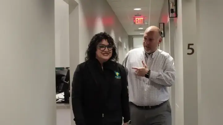 Weatherford dental team member standing next to dental patient