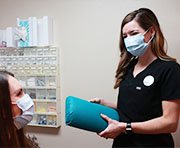 Two Weatherford dental team members talking to each other