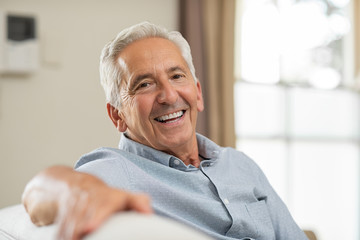 person with dental implants smiling