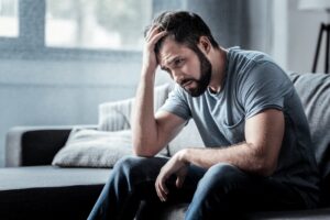 Man with poor mental health due to gum disease